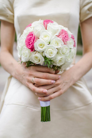 wedding bouquet in hands of the brideの写真素材
