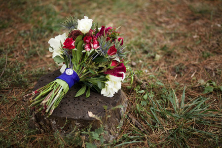 bridal bouquet on the stumpの写真素材