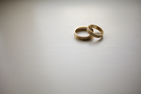 Wedding rings on a white backgroundの写真素材