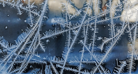 lines, frosty patterns on the window glass, texture of frosty patterns