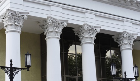 design of the upper part of the columns in the antique style on the building of the city organ hall
