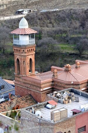 minaret tower in Tbilisi, Georgia made of red brick