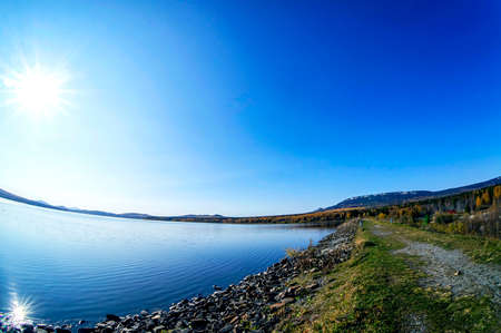 Golden autumn in the vicinity of lake Zyuratkul, colorful trees, Ural mountains, picturesque...