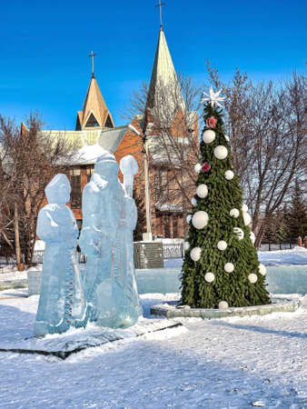 Santa Claus and Snow Maiden and ice figures at the New Year's playground, South Ural, Chelyabinskの写真素材