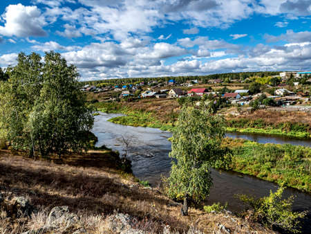 beautiful picturesque autumn landscape in the southern Urals, the area in the area of the marble quarry near village of Prokhorovoの写真素材