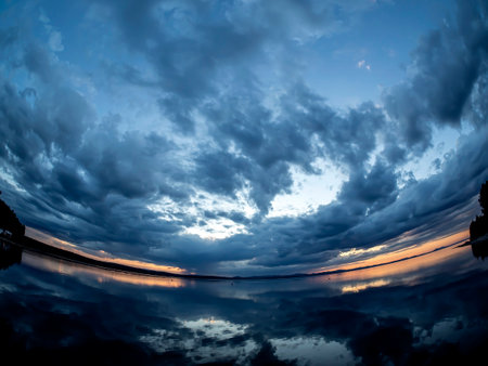 cloudy morning sky over the lake, Lake Uvildy, southern Urals, fisheye lensの写真素材