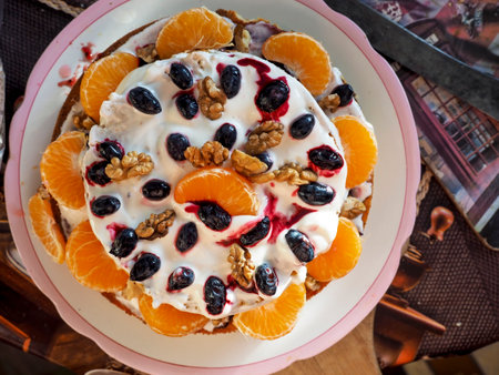 homemade cake decorated with fruits and berries