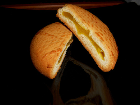 Lemon pie on a black plate