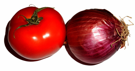 Tomato and onion isolated on whiteの写真素材