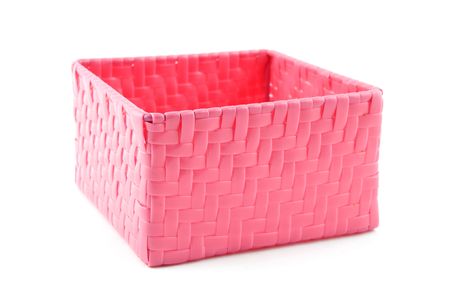 pink wicker basket isolated on white backgroundの写真素材