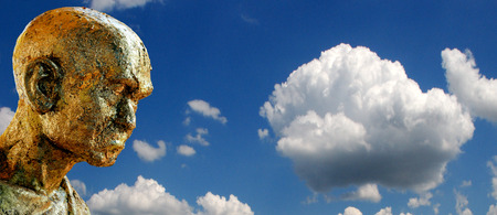 head Buddha on background cloudy skyの写真素材