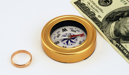 scene engagement ring , compass,dollars on white backgroundの写真素材