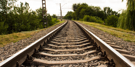 Railway tracks in the countryside. Shallow depth of field.