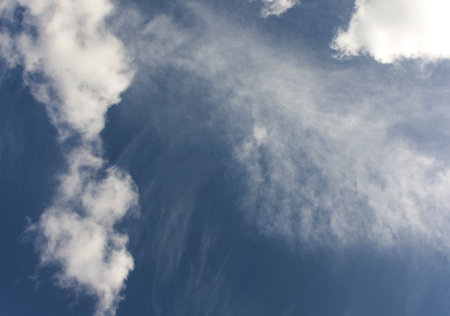 Blue sky with white clouds. Sky background. Sky with clouds weather nature cloud blue. Blue sky with clouds and sun.の写真素材