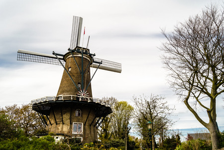 ALKMAAR, THE NETHERLANDS - APRIL 22, 2016: "De Groot" ("Molen van Piet") windmill in Alkmaar, the Netherlands, built in 1769 is now out of operation, being used as house and also as museum.のeditorial素材