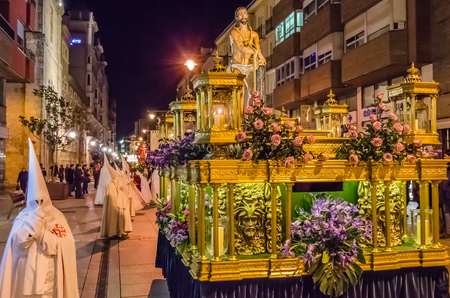 PALENCIA, SPAIN - MARCH 24, 2016: Traditional Spanish Holy Week (Semana Santa) procession on Holy Thursday night in the streets of Palencia (Castilla y Leon), Spainのeditorial素材