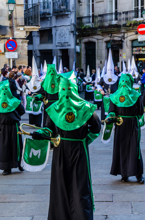 SANTIAGO DE COMPOSTELA, SPAIN - APRIL 3, 2015: Traditional Spanish Holy Week (Semana Santa) procession on Holy Friday in the streets of Santiago de Compostela (Galicia), Spainのeditorial素材