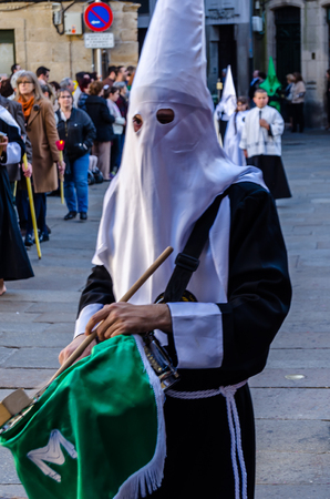 SANTIAGO DE COMPOSTELA, SPAIN - APRIL 3, 2015: Traditional Spanish Holy Week (Semana Santa) procession on Holy Friday in the streets of Santiago de Compostela (Galicia), Spainのeditorial素材