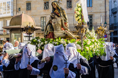 SANTIAGO DE COMPOSTELA, SPAIN - APRIL 3, 2015: Traditional Spanish Holy Week (Semana Santa) procession on Holy Friday in the streets of Santiago de Compostela (Galicia), Spainのeditorial素材