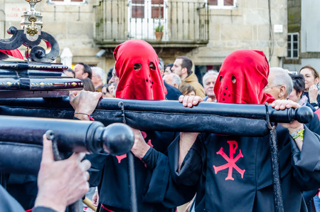 SANTIAGO DE COMPOSTELA, SPAIN - APRIL 3, 2015: Traditional Spanish Holy Week (Semana Santa) procession on Holy Friday in the streets of Santiago de Compostela (Galicia), Spainのeditorial素材