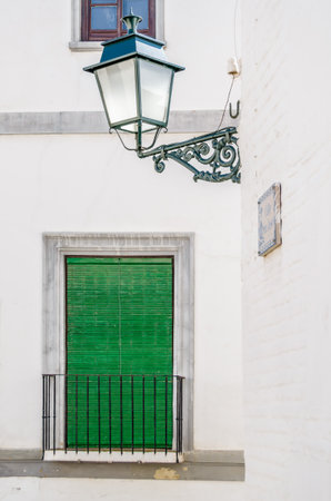 GRANADA, SPAIN - FEBRUARY 22, 2015: Urban scene, view of a street in Granada, Andalusia, southern Spainのeditorial素材