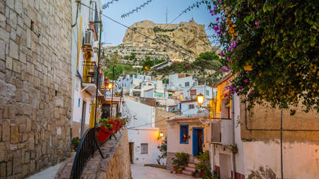 ALICANTE, SPAIN - DECEMBER 30, 2018: View of Santa Barbara Castle from Santa Cruz neighborhood, in the old Mediterranean town of Alicante, Spain.のeditorial素材