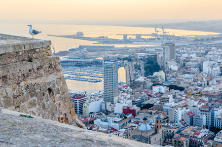 ALICANTE, SPAIN - DECEMBER 27, 2018: View of Santa Barbara castle and the Mediterranean city of...