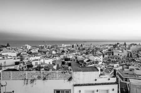 ALICANTE, SPAIN - DECEMBER 30, 2018: Cityscape of Alicante at dusk, seen from Santa Cruz neighborhood; black and white imageのeditorial素材