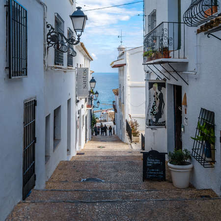 ALTEA, SPAIN - DECEMBER 28, 2018: Narrow streets in the Mediterranean white village of Altea, Alicante province, Spainのeditorial素材