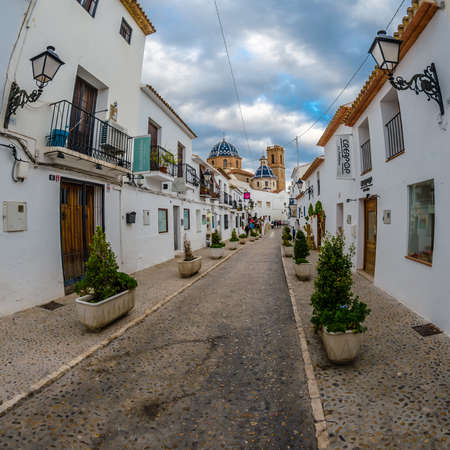 ALTEA, SPAIN - DECEMBER 28, 2018: Narrow streets in the Mediterranean white village of Altea, Alicante province, Spainのeditorial素材