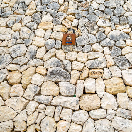 ALTEA, SPAIN - DECEMBER 28, 2018: Tourist information sign showing directions to the Catholic church in the village of Altea, Alicante province, Spainのeditorial素材
