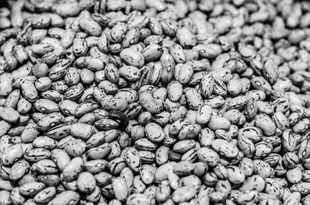Detail of raw beans, textured food backgroundの写真素材