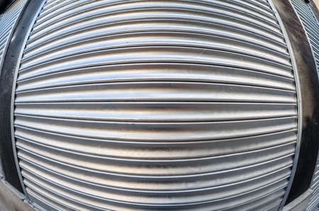 Textured background of a closed metal blindの写真素材