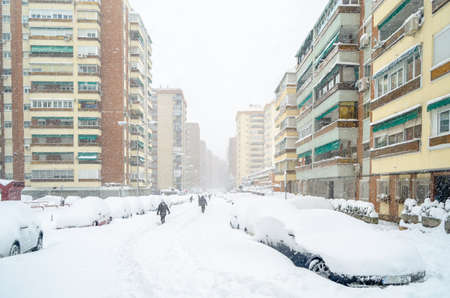 MADRID, SPAIN â€“ JANUARY 9, 2021: Streets of Madrid blanketed with the heaviest snowfall in 50...