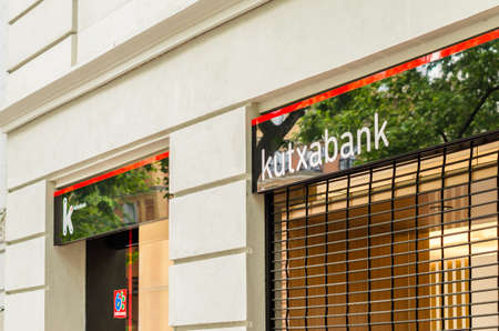 MADRID, SPAIN â MAY 12, 2021: Kutxabank branch office in Madrid, Spain. Kutxabank is a Spanish bank founded and based in Bilbao in 2012のeditorial素材
