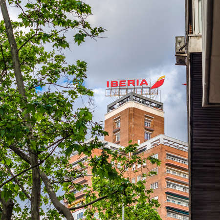 MADRID, SPAIN â MAY 12, 2021: Iberia airlines logo on the top of a building in Madrid, Spainのeditorial素材