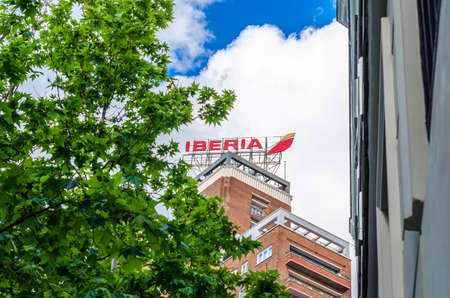 MADRID, SPAIN â MAY 12, 2021: Iberia airlines logo on the top of a building in Madrid, Spainのeditorial素材