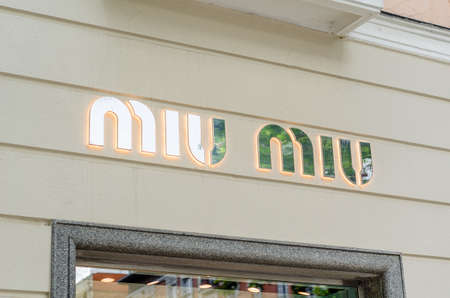 MADRID, SPAIN â MAY 12, 2021: Facade of a Miu Miu store in Madrid, Spain. Miu Miu is an Italian high fashion women's clothing and accessory brand, subsidiary of Prada.のeditorial素材