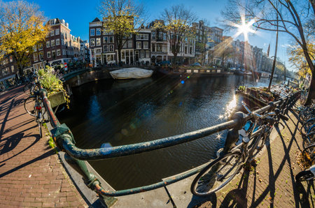 AMSTERDAM, THE NETHERLANDS - NOVEMBER 18, 2018: Urban scene in Amsterdam, the Netherlands. Fish eye viewのeditorial素材
