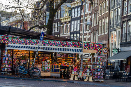 AMSTERDAM, THE NETHERLANDS - NOVEMBER 18, 2018: Typical shop in the flower market in Amsterdam, a...