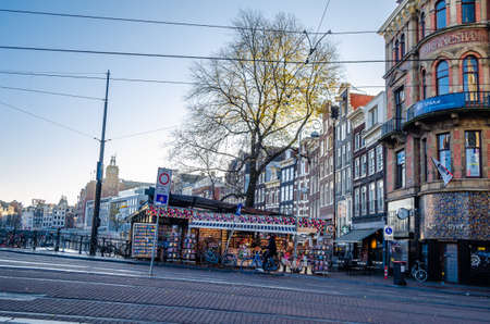 AMSTERDAM, THE NETHERLANDS - NOVEMBER 18, 2018: Typical shop in the flower market in Amsterdam, a popular tourist attraction located on the Singel canalのeditorial素材