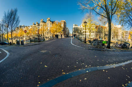 AMSTERDAM, THE NETHERLANDS - NOVEMBER 18, 2018: Urban scene in Amsterdam, the Netherlands. Fish eye viewのeditorial素材