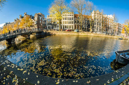 AMSTERDAM, THE NETHERLANDS - NOVEMBER 18, 2018: Urban scene in Amsterdam, the Netherlands. Fish eye viewのeditorial素材