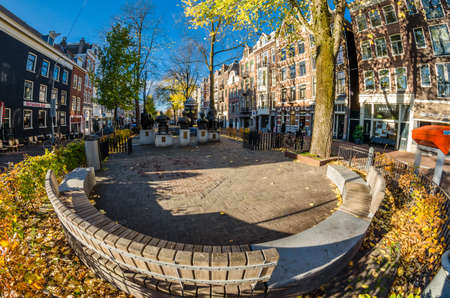 AMSTERDAM, THE NETHERLANDS - NOVEMBER 18, 2018: Urban scene in Amsterdam, the Netherlands. Fish eye viewのeditorial素材