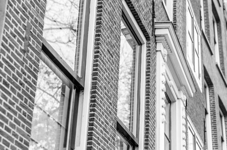 Typical Dutch architecture in Amsterdam, the Netherlands. Black and white image