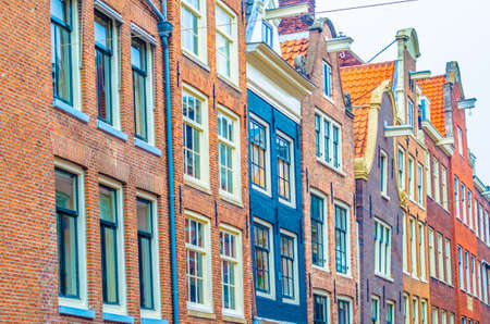 Typical Dutch architecture in Amsterdam, the Netherlands. Colorful illustrationの写真素材