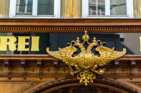 GRAZ, AUSTRIA - AUGUST 31, 2013: Facade of HofbÃ¤ckerei Edegger-Tax, the oldest still functioning bakery in Graz, Austria, founded in 1569のeditorial素材