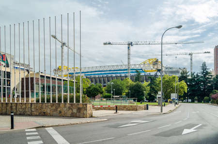 MADRID, SPAIN - SEPTEMBER 13, 2021: Cranes in the renovation works of the Santiago BernabÃ©u Stadium, home of Real Madridのeditorial素材
