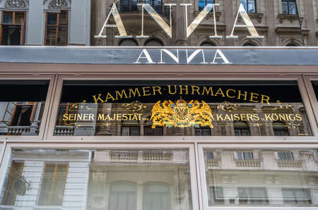 VIENNA, AUSTRIA - SEPTEMBER 1, 2013: Store front detail and logo in Vienna, Austria, sign on the facade of the former shop of the watchmaker of the kingのeditorial素材