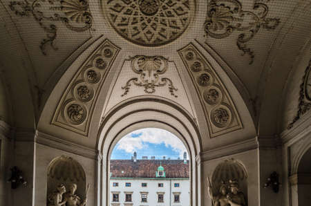 VIENNA, AUSTRIA - SEPTEMBER 1, 2013: Architectural detail at the entrance of The Hofburg imperial palace in Vienna, Austriaのeditorial素材